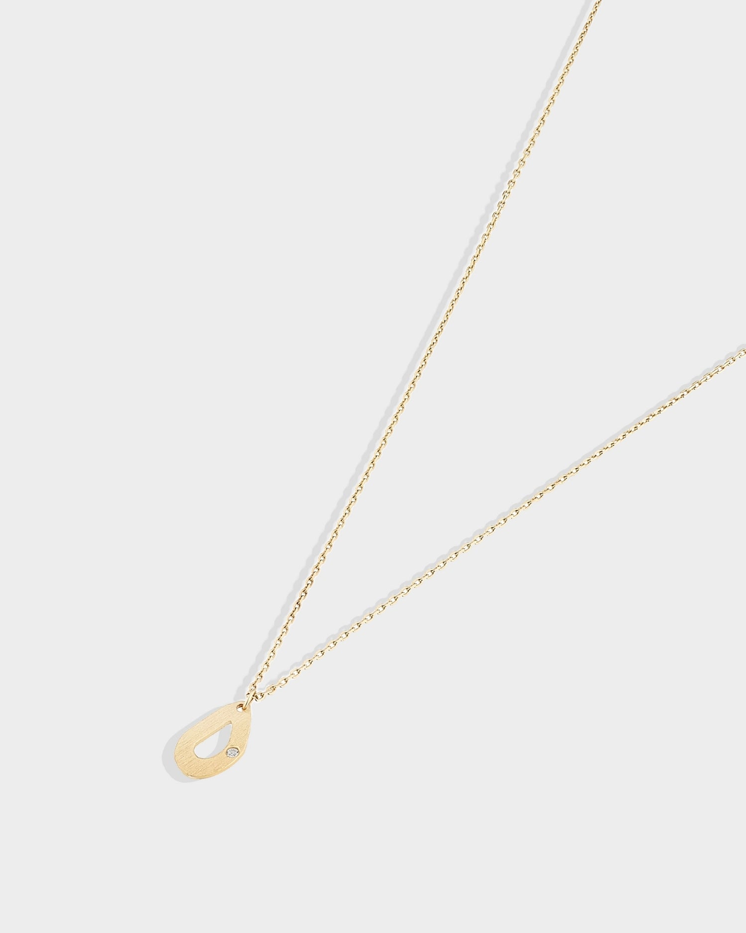 14k gold mini seashell necklace with natural diamond