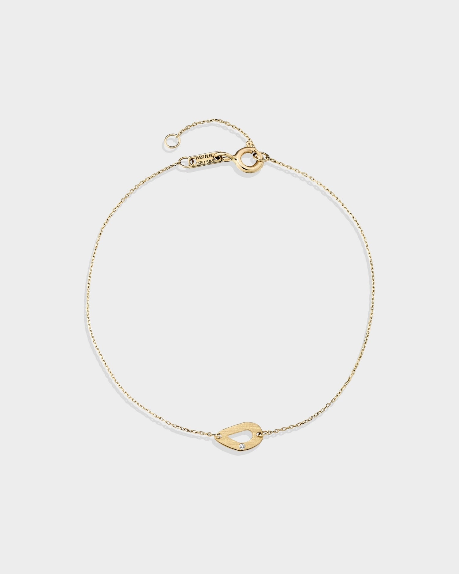 14k gold mini seashell bracelet with natural diamond