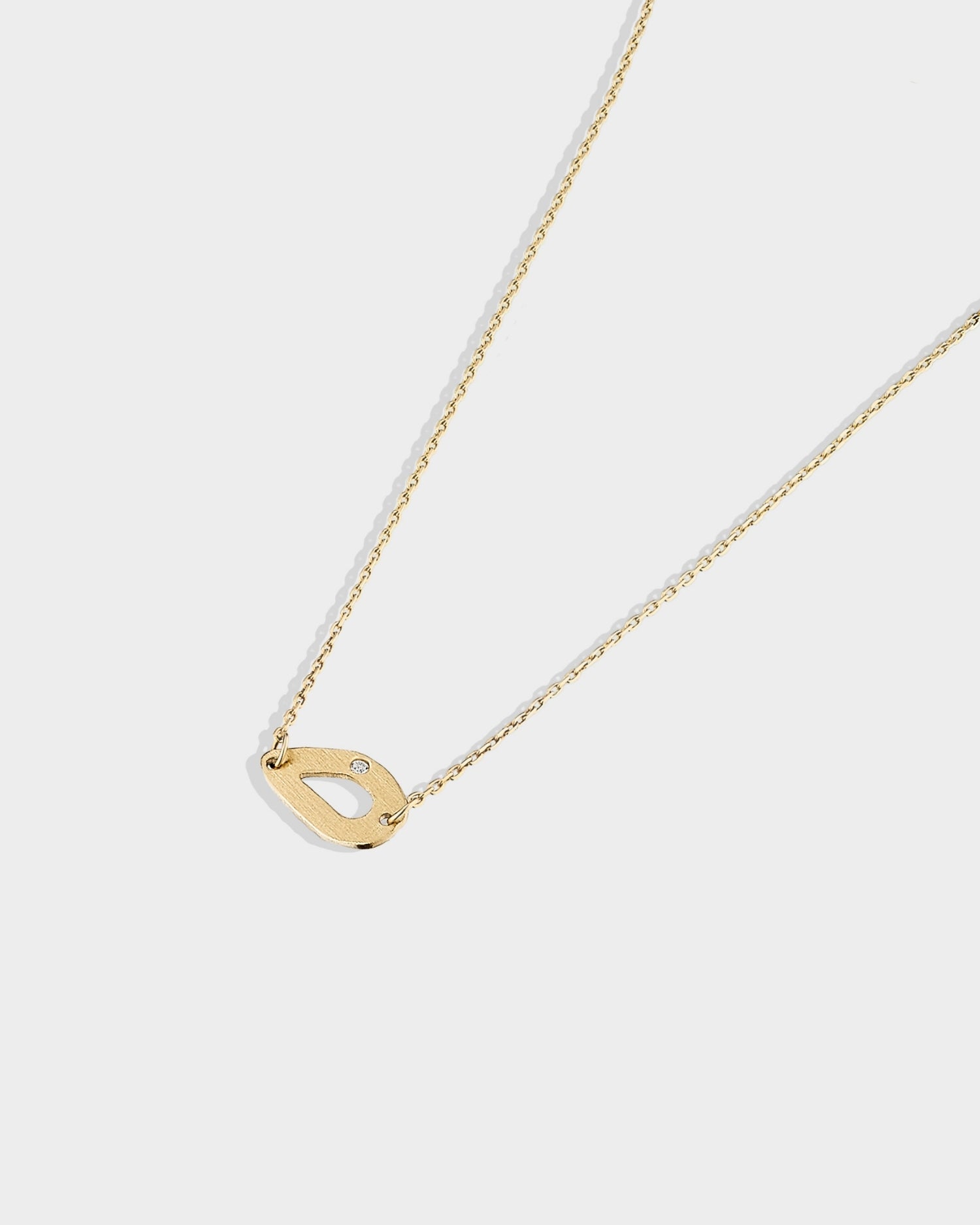 14k gold mini seashell bracelet with natural diamond