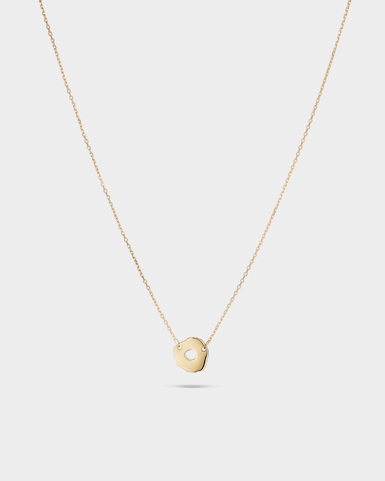 14k gold mini round seashell necklace
