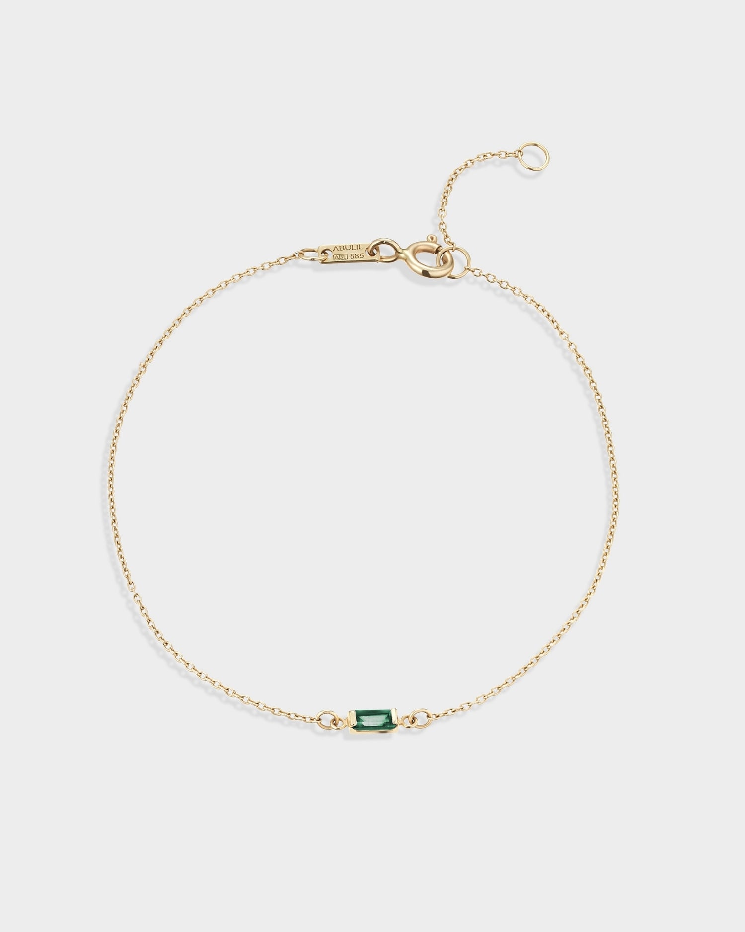 Baguette 14k gold bracelet with emerald gemstone