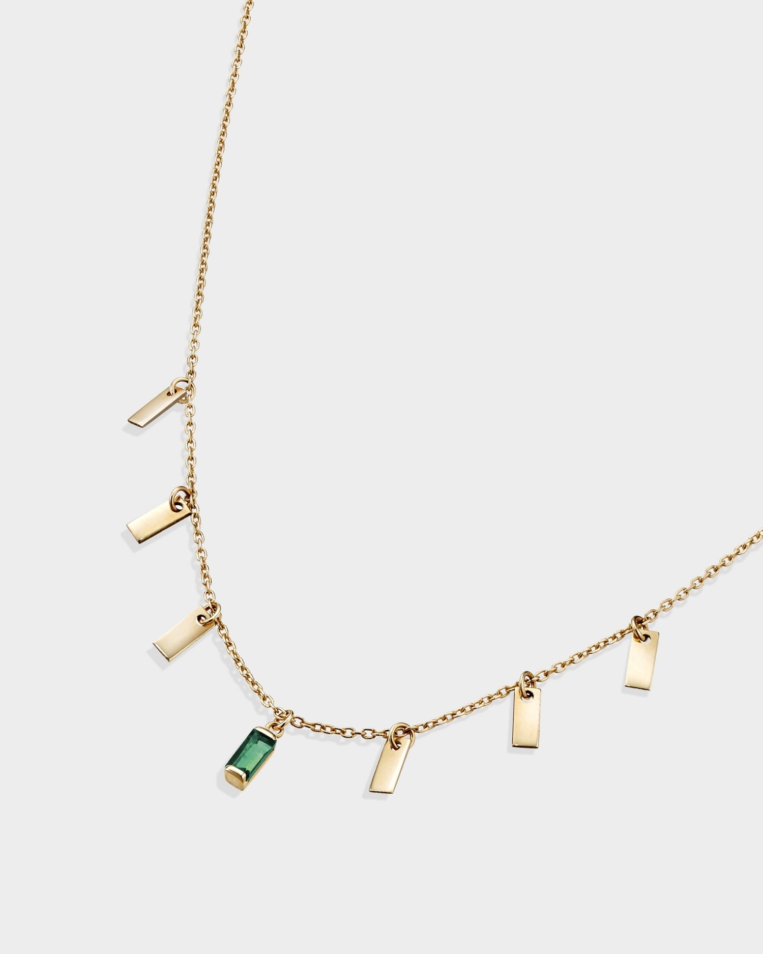 Baguette 14k gold string necklace with emerald gemstone