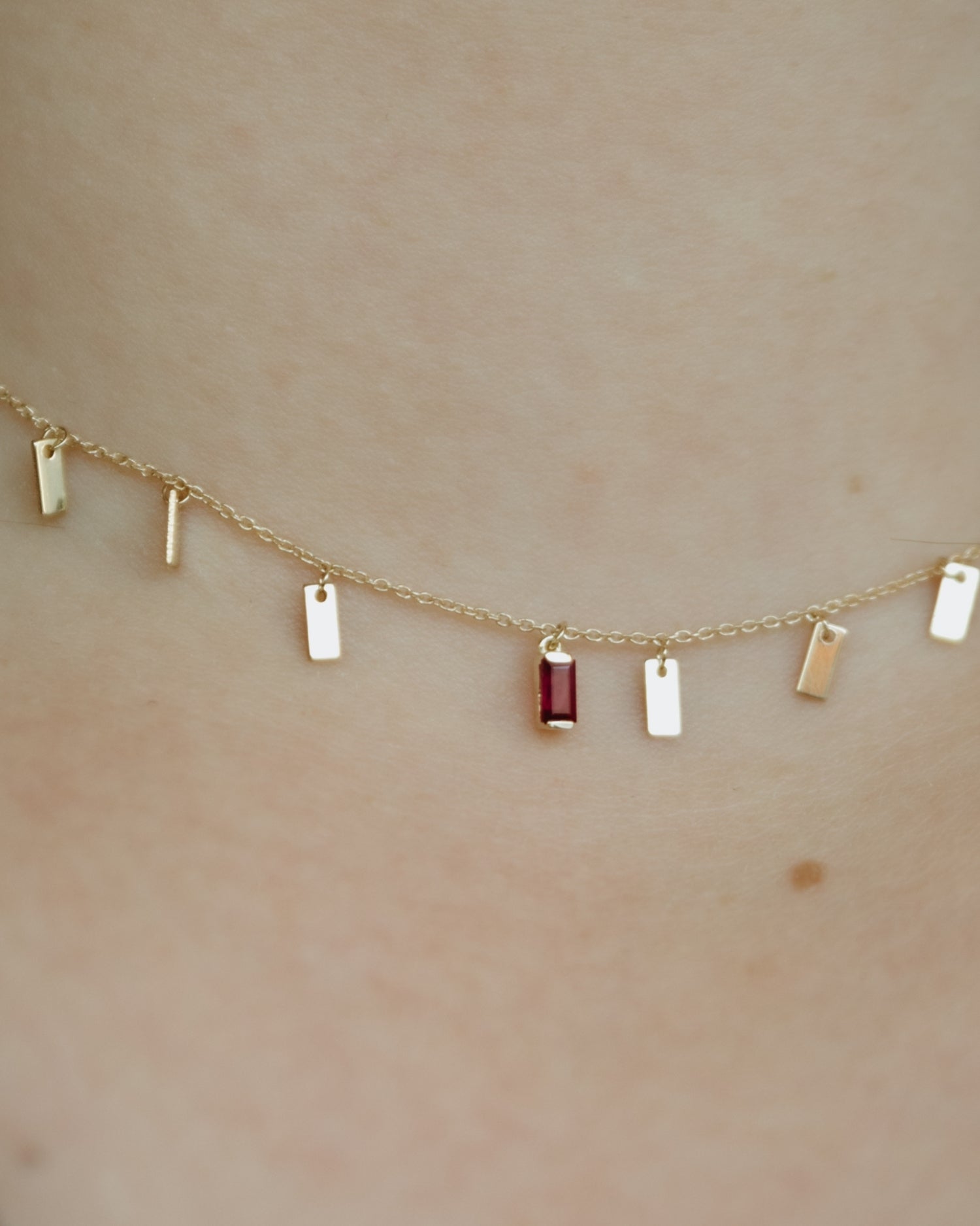 Baguette 14k gold string necklace with ruby gemstone