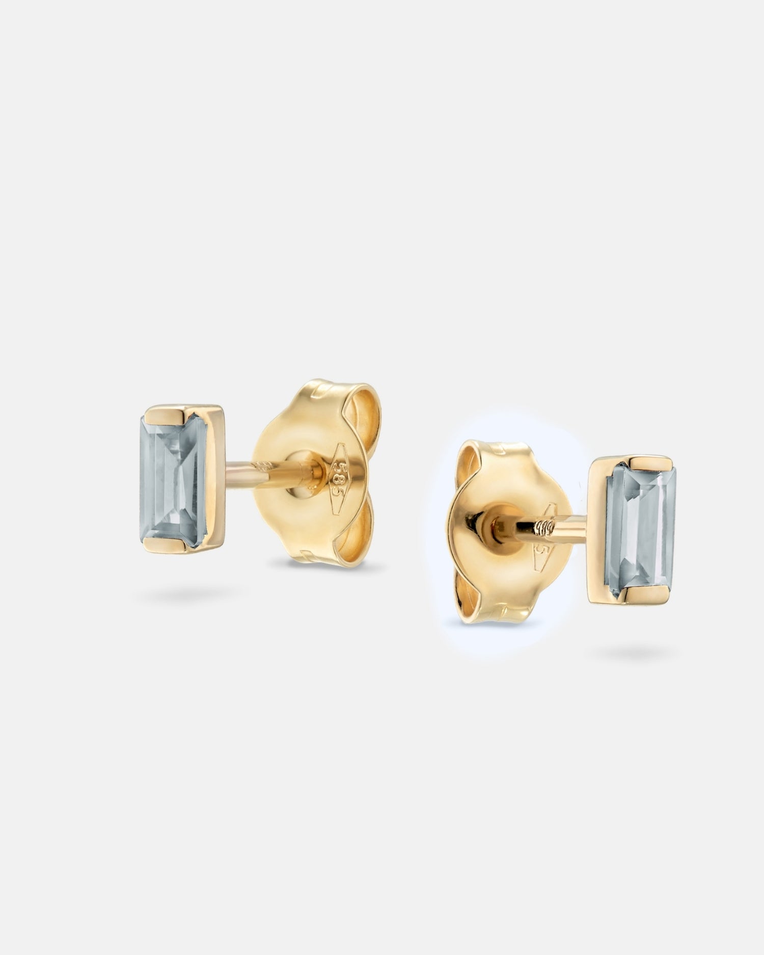Baguette 14k gold stud earrings with aquamarine gemstones