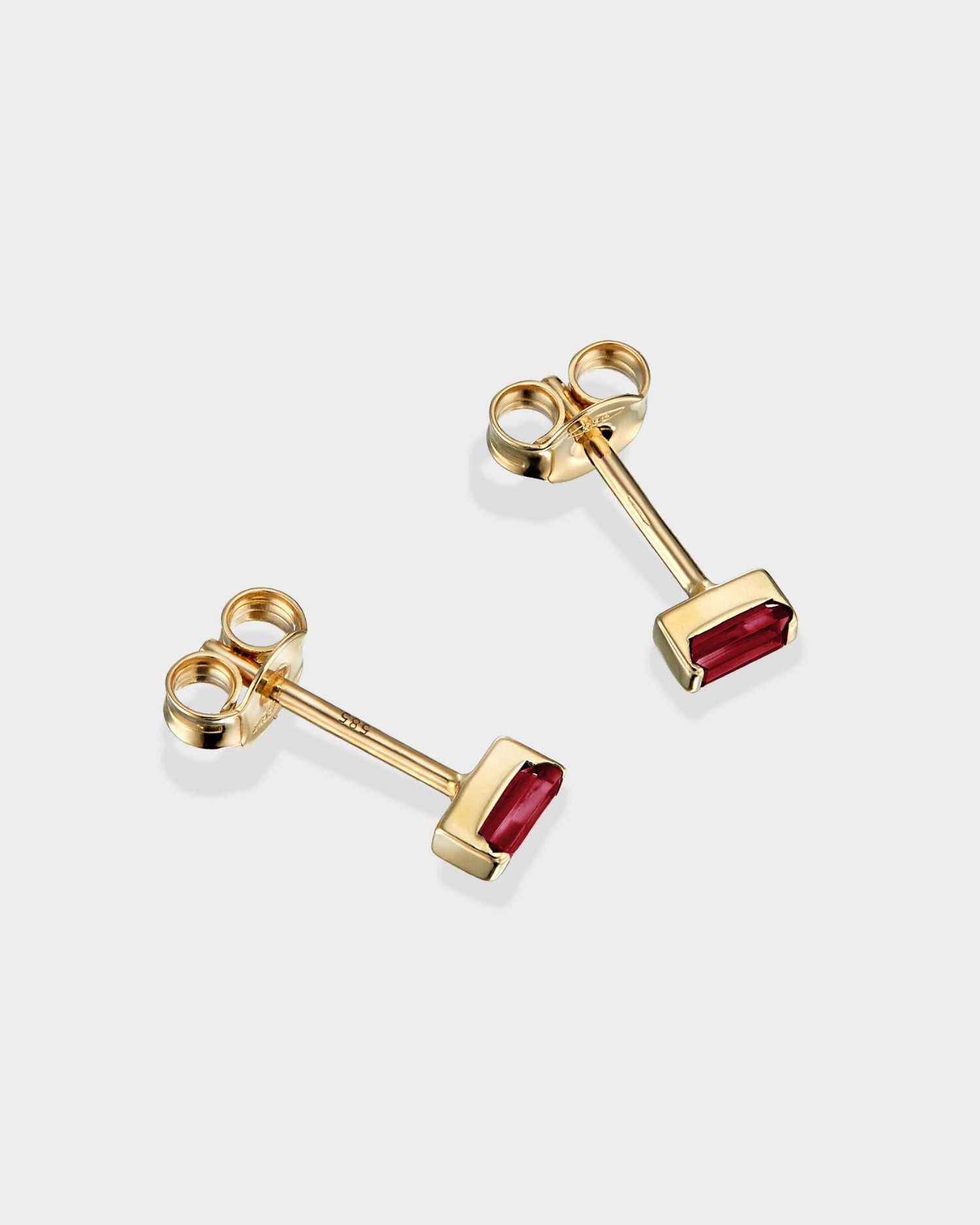Baguette 14k gold stud earrings with ruby gemstones