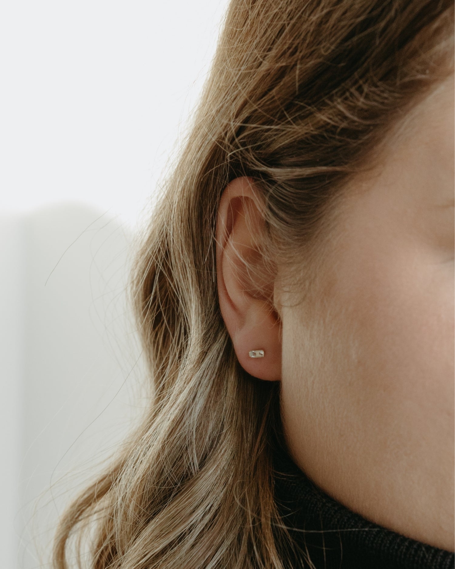 Baguette 14k gold stud earrings with natural diamonds