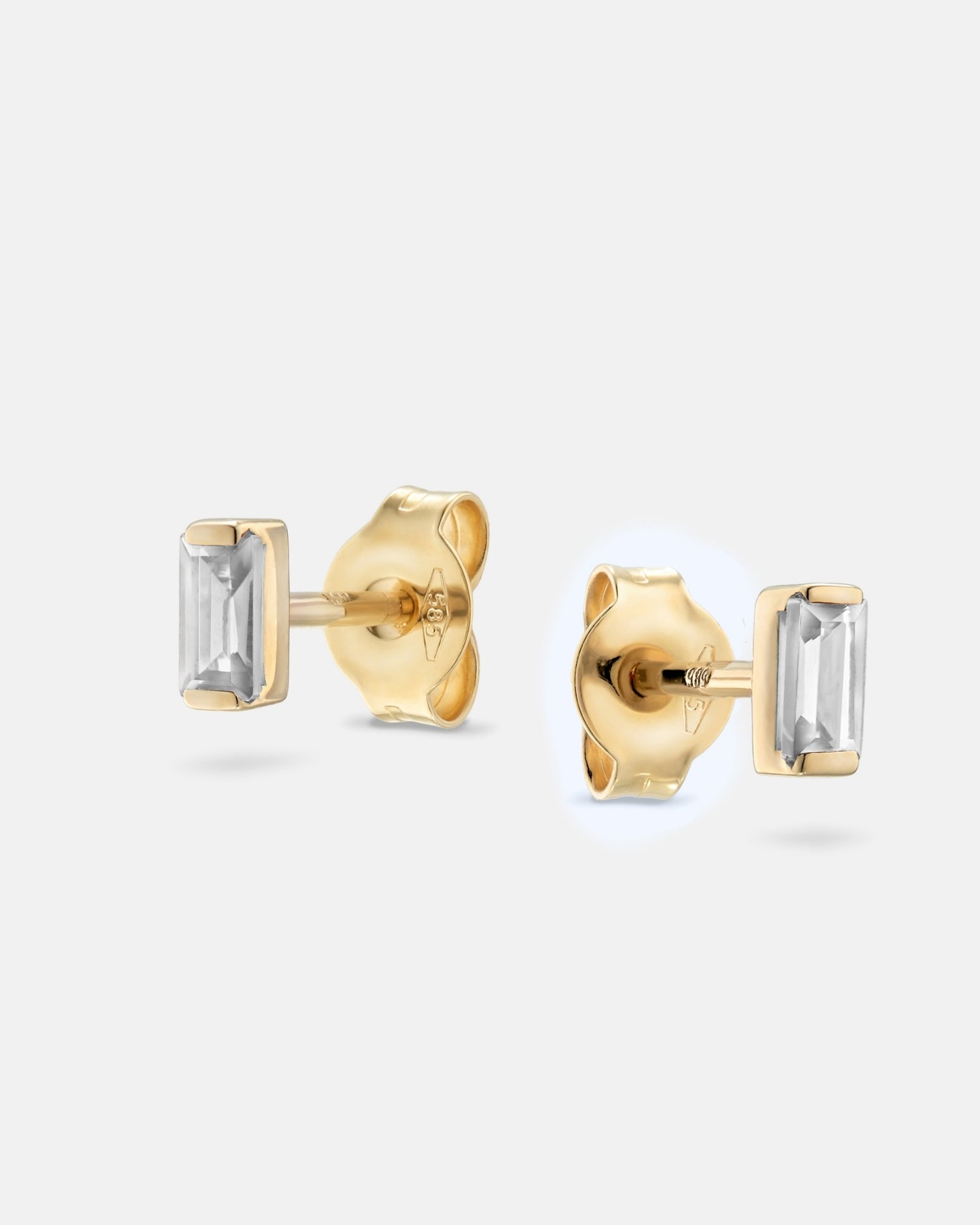 Baguette 14k gold stud earrings with natural diamonds