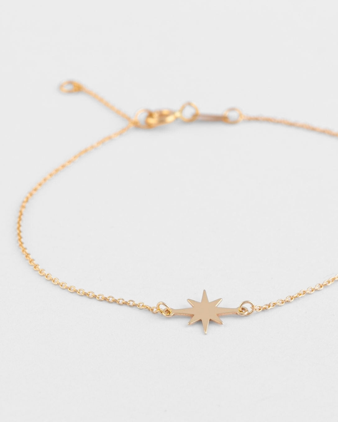 Yellow gold star bracelet