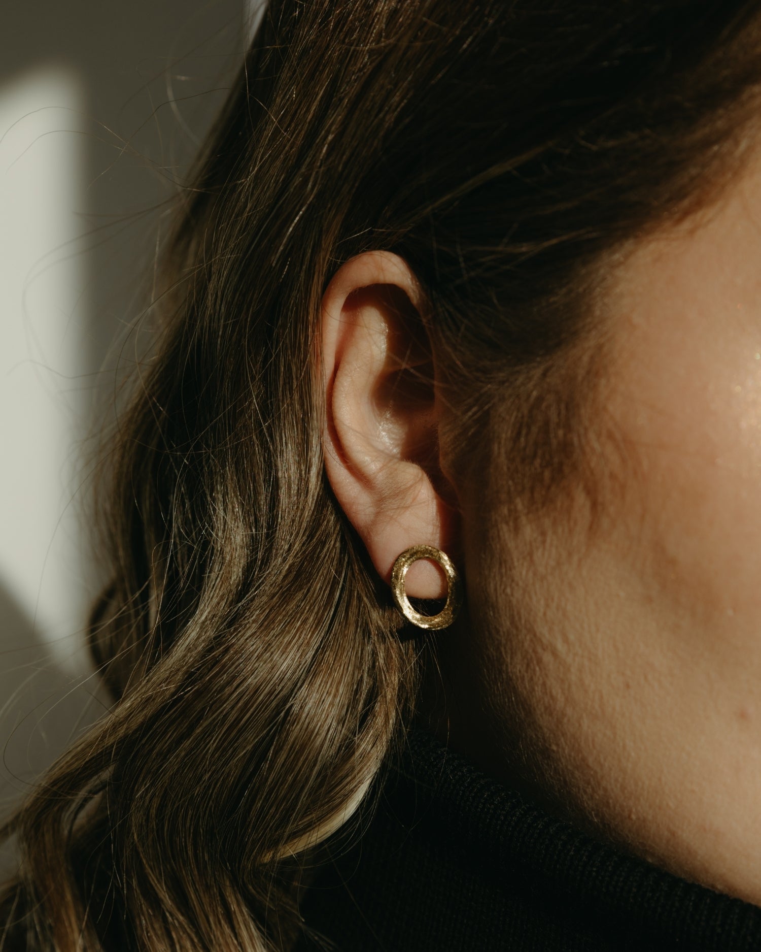 Brushed circle yellow gold stud earrings