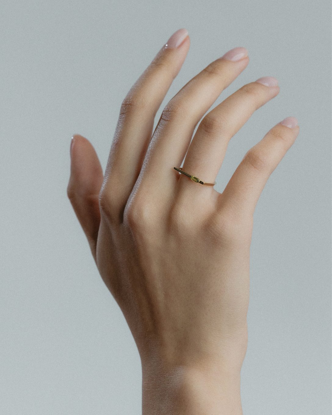 Inel Baguette din aur galben cu peridot