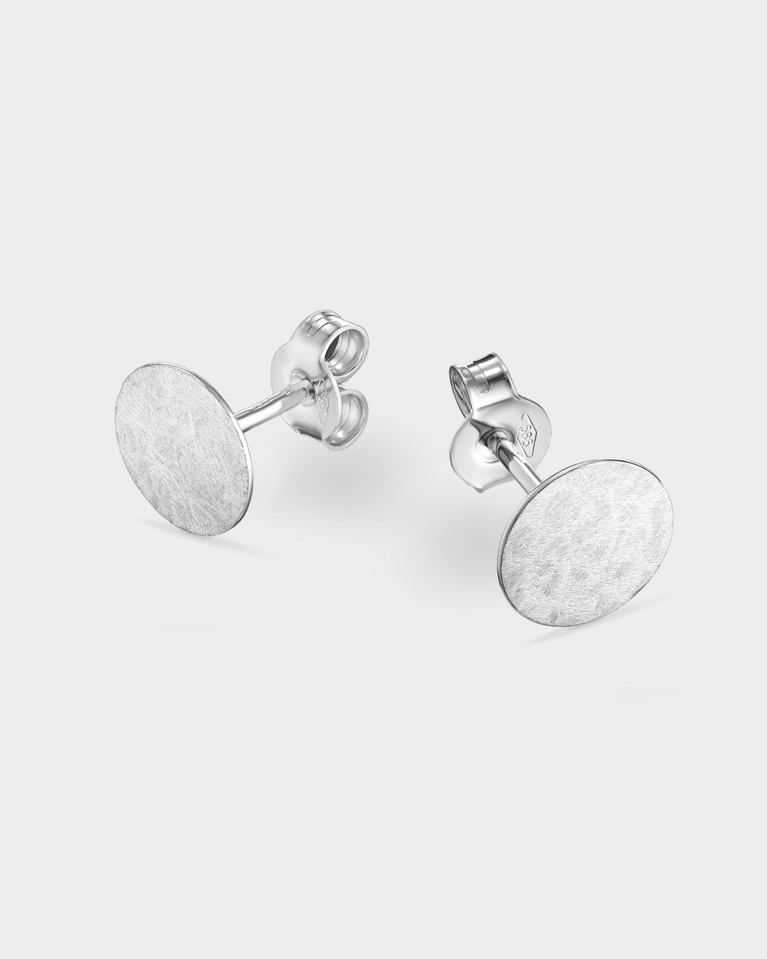 Brushed white gold mini circle stud earrings