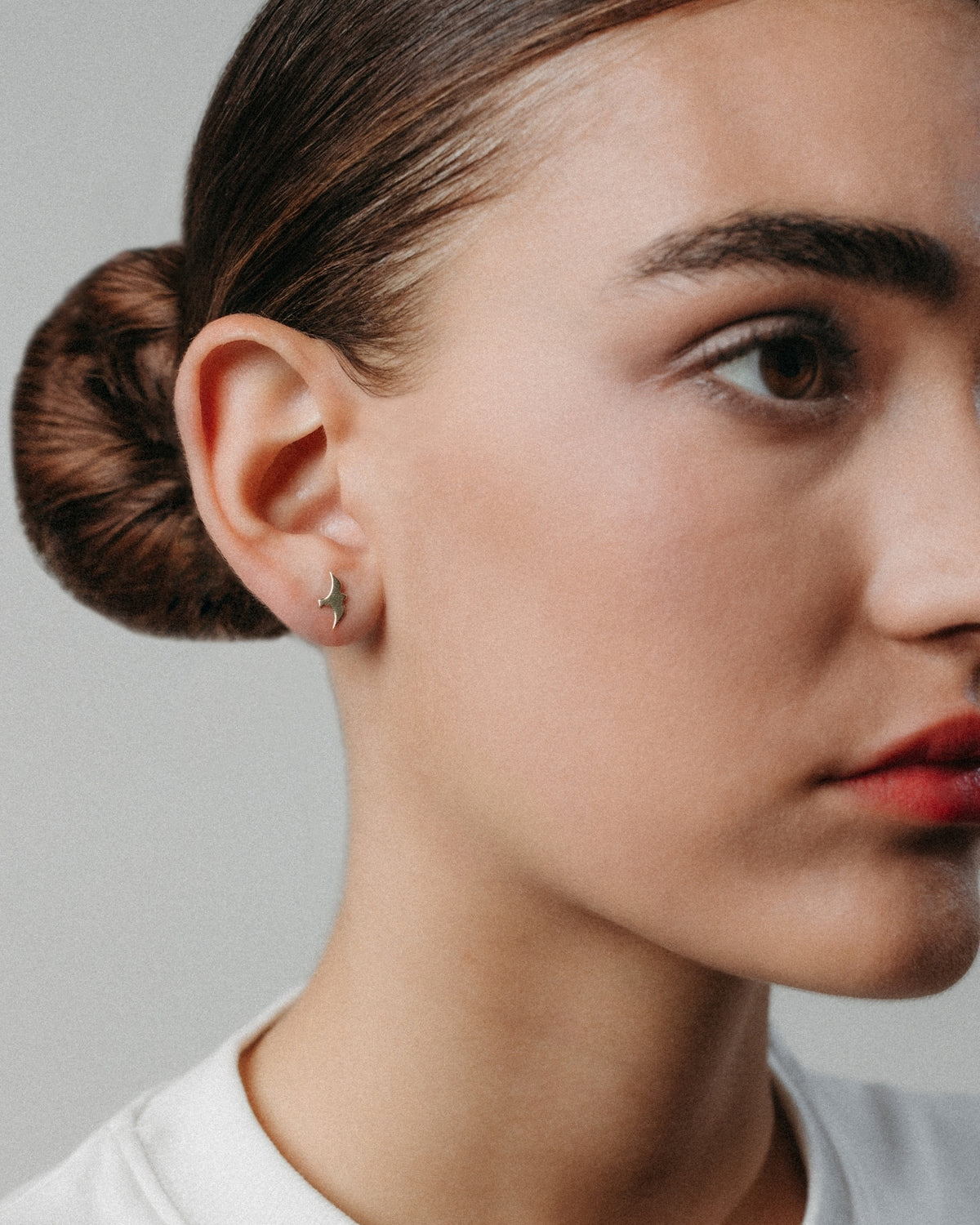 Yellow gold bird stud earrings