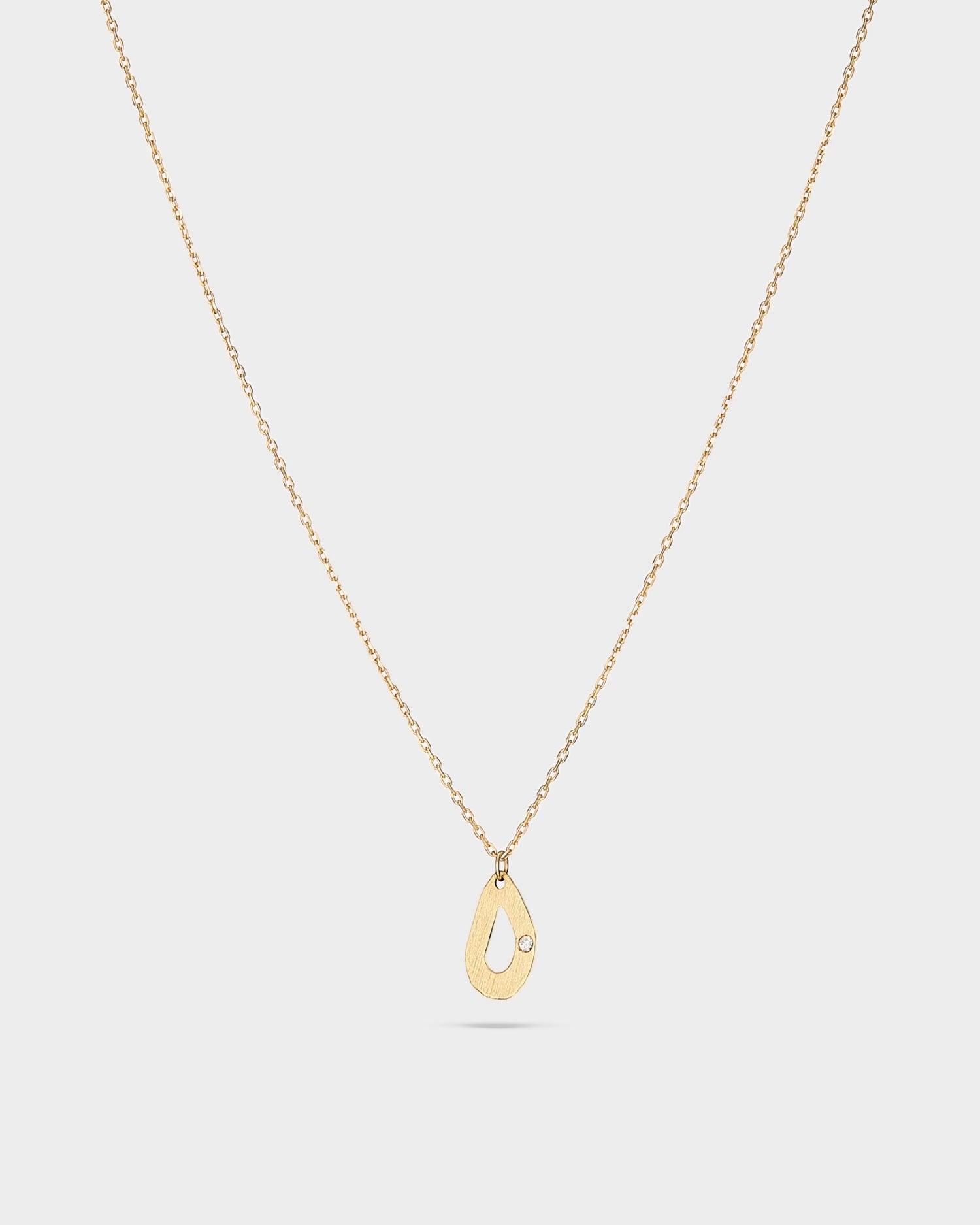 14k gold mini seashell necklace with natural diamond