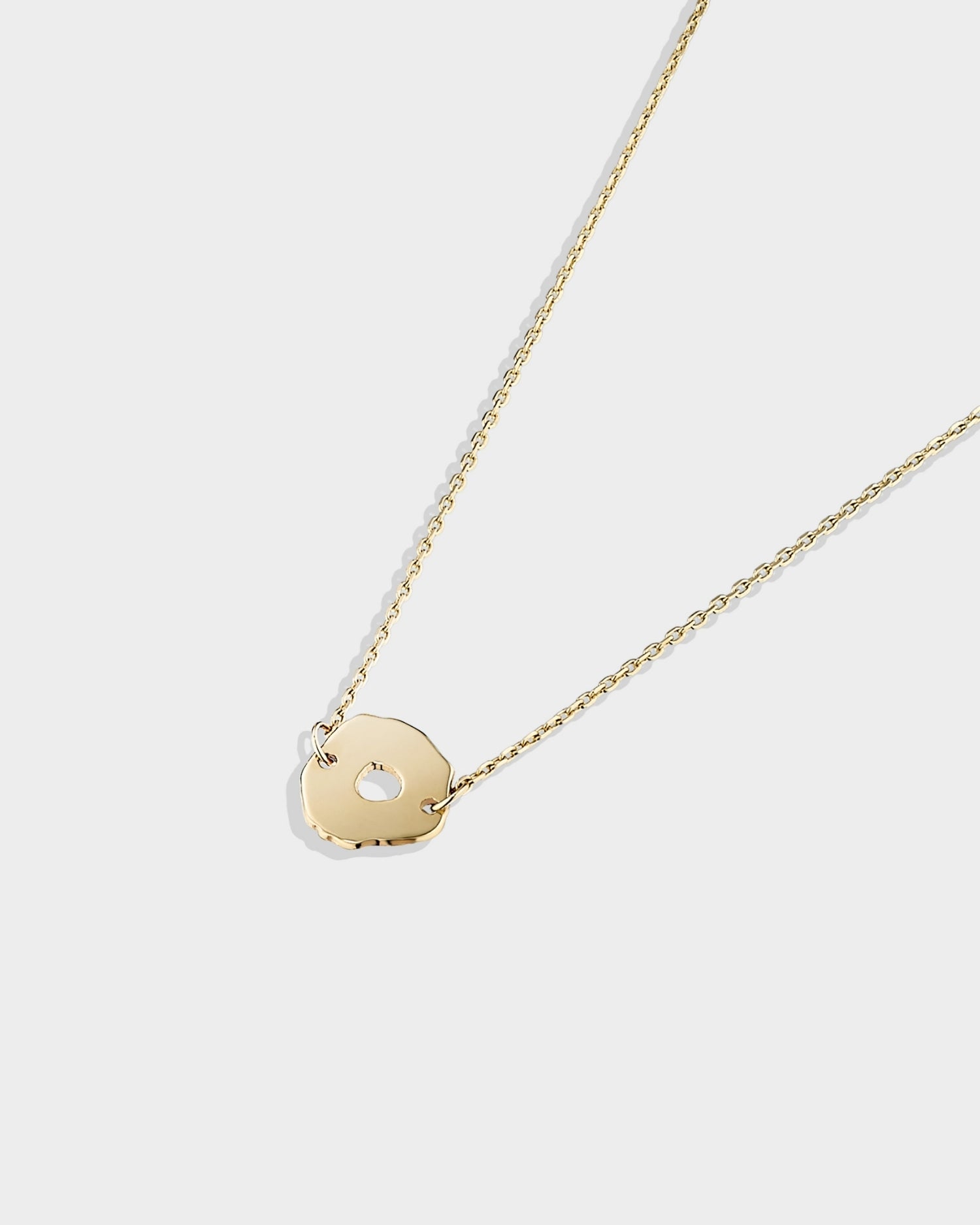 14k gold mini round seashell bracelet