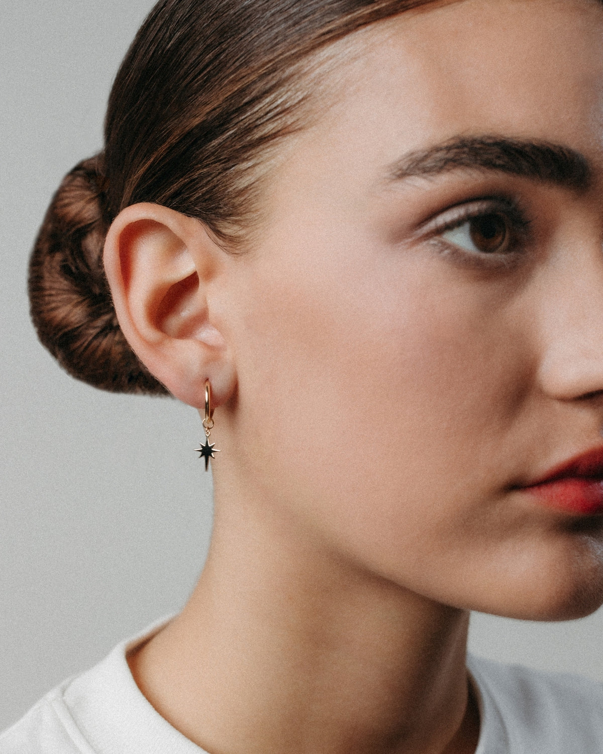 Small yellow gold star hoop earrings