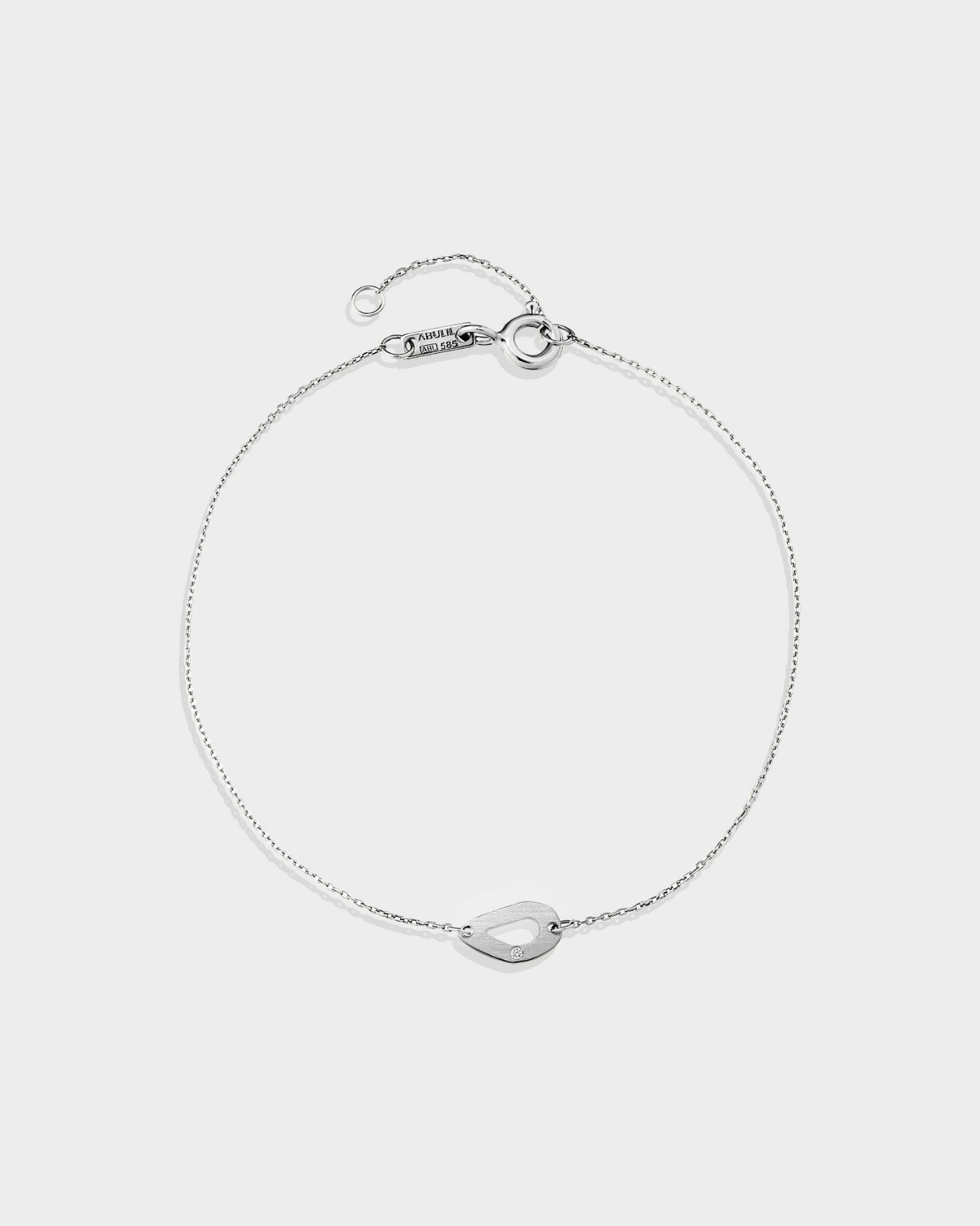 14k white gold mini seashell bracelet with natural diamond