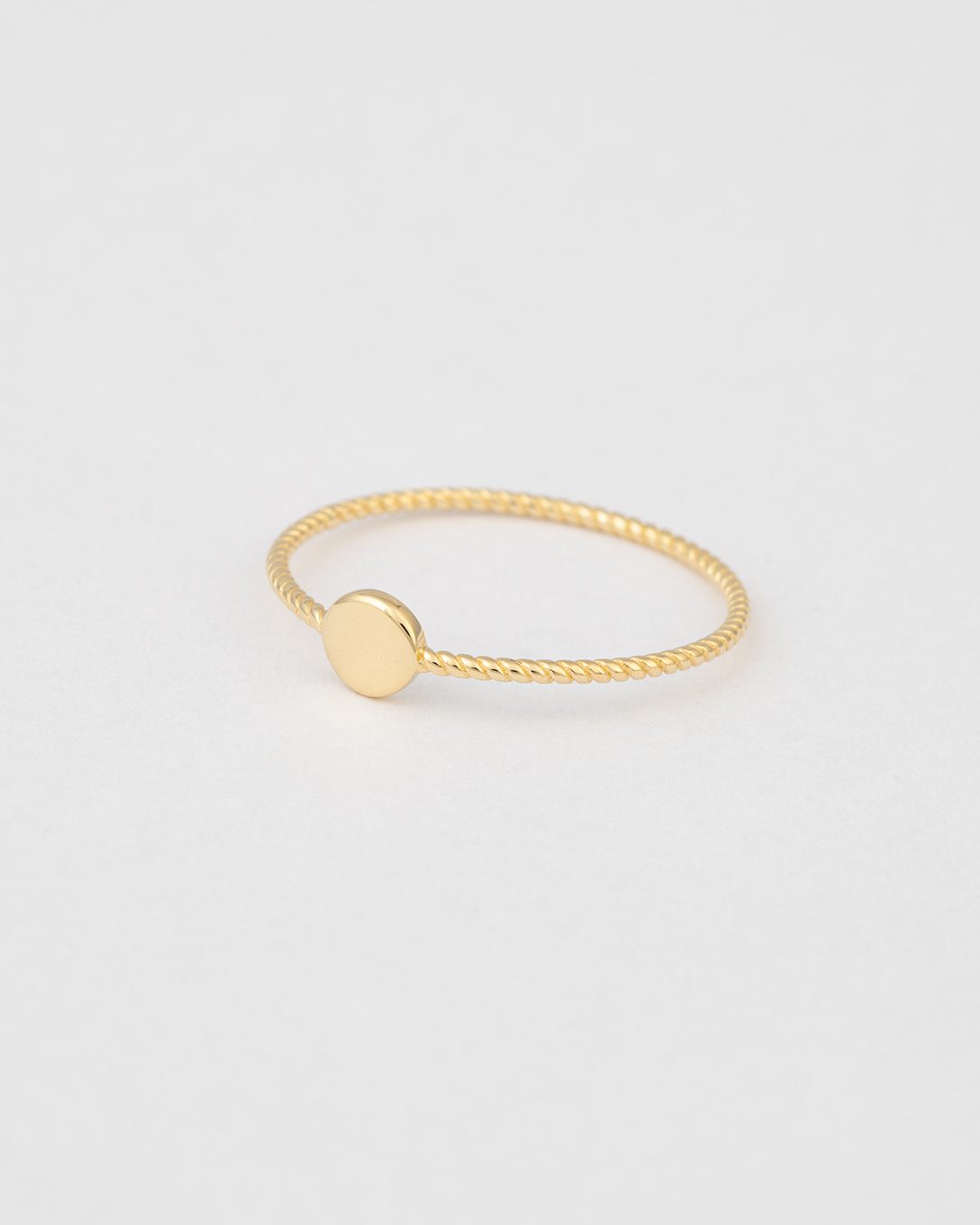 Small yellow gold circle ring