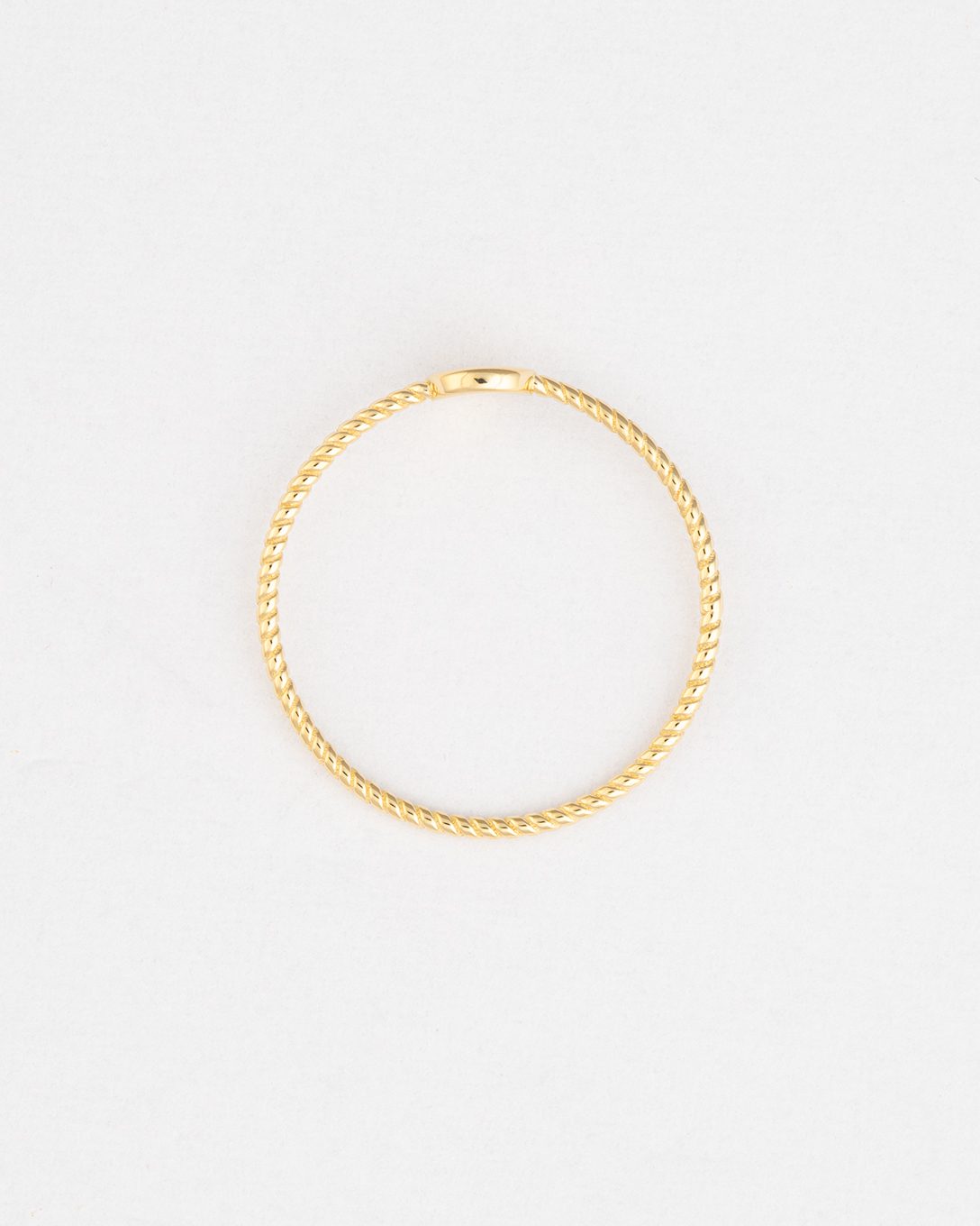 Small yellow gold circle ring