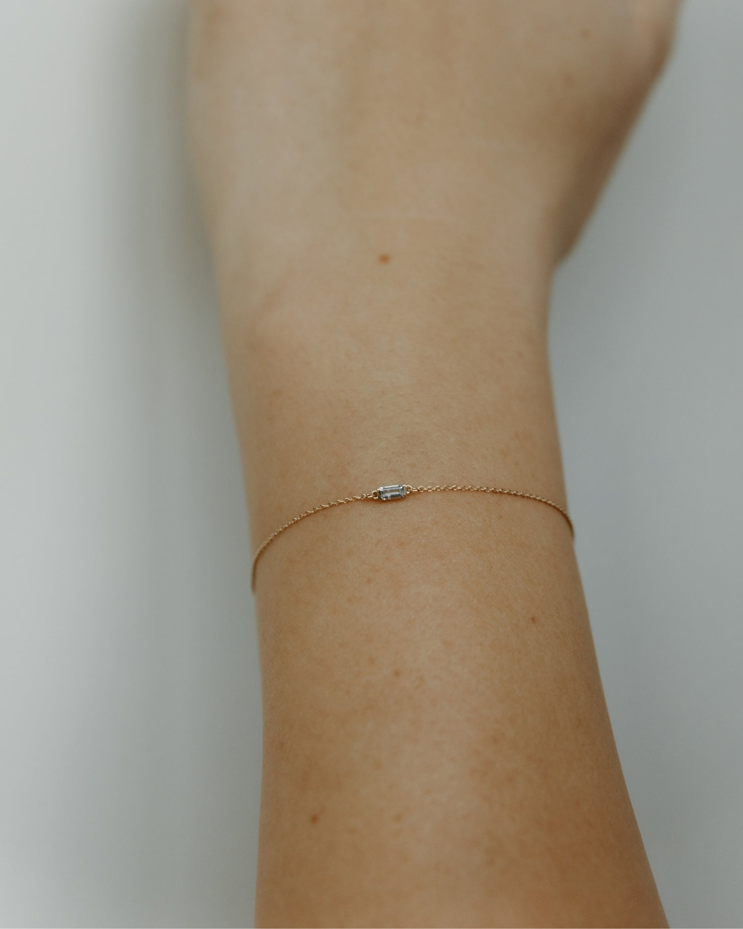 Baguette 14k gold bracelet with aquamarine gemstone