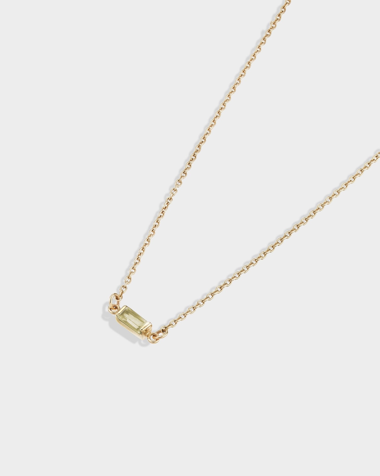 Baguette 14k gold bracelet with peridot gemstone