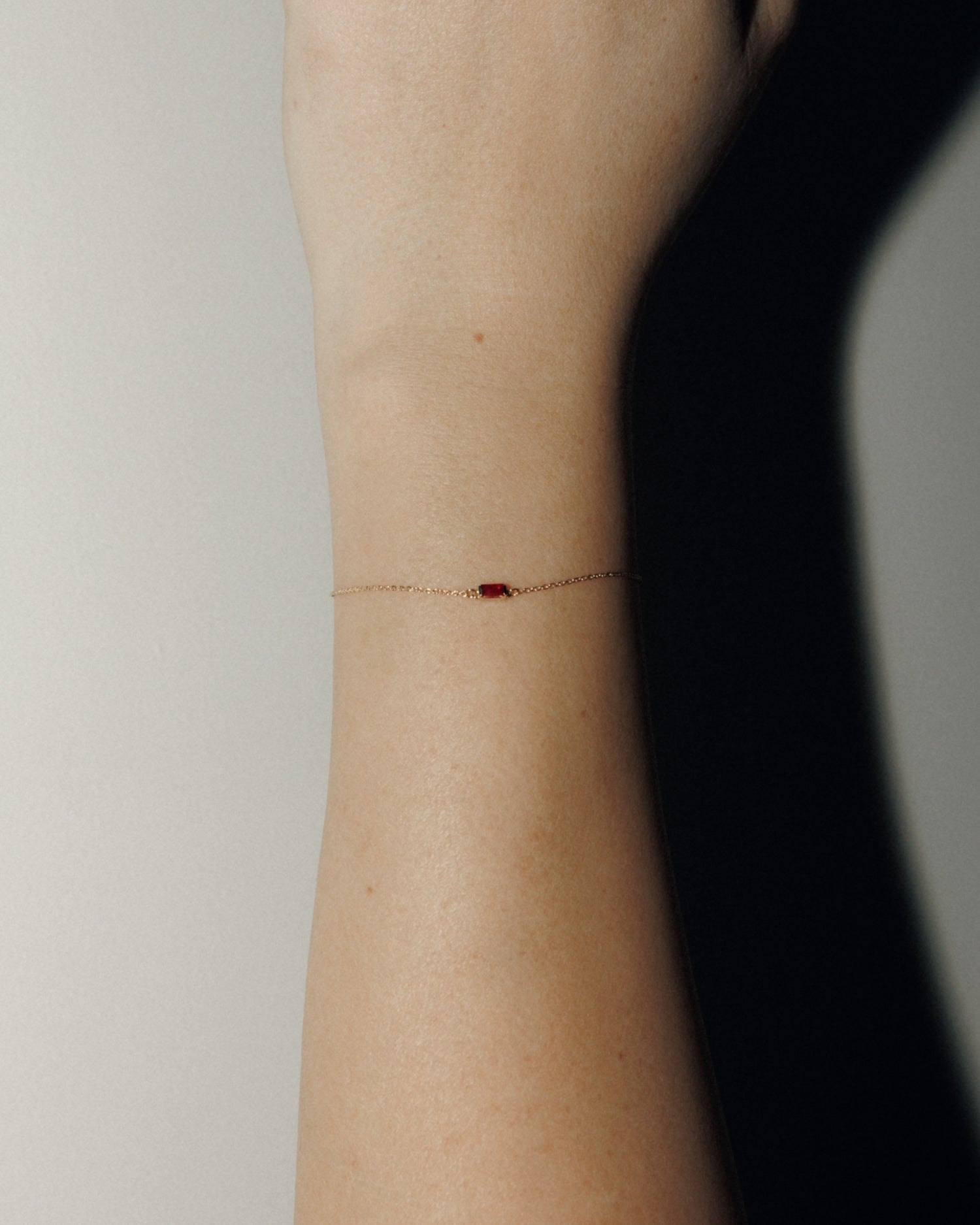 Baguette 14k gold bracelet with ruby gemstone