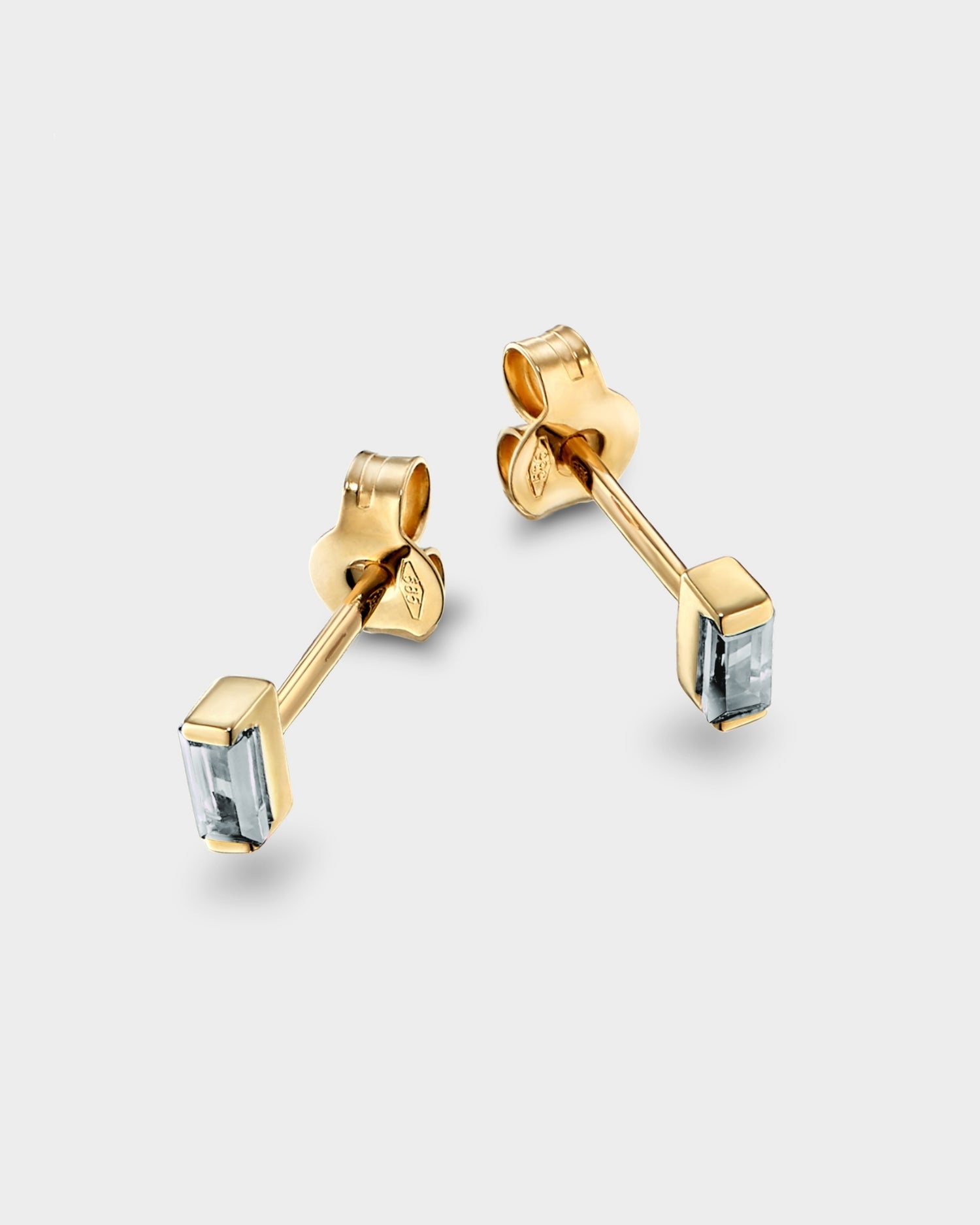 Baguette 14k gold stud earrings with aquamarine gemstones