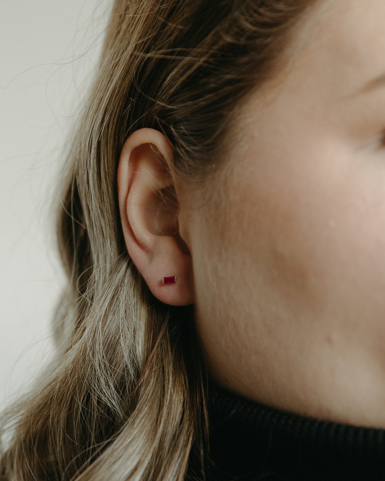 Baguette 14k gold stud earrings with ruby gemstones