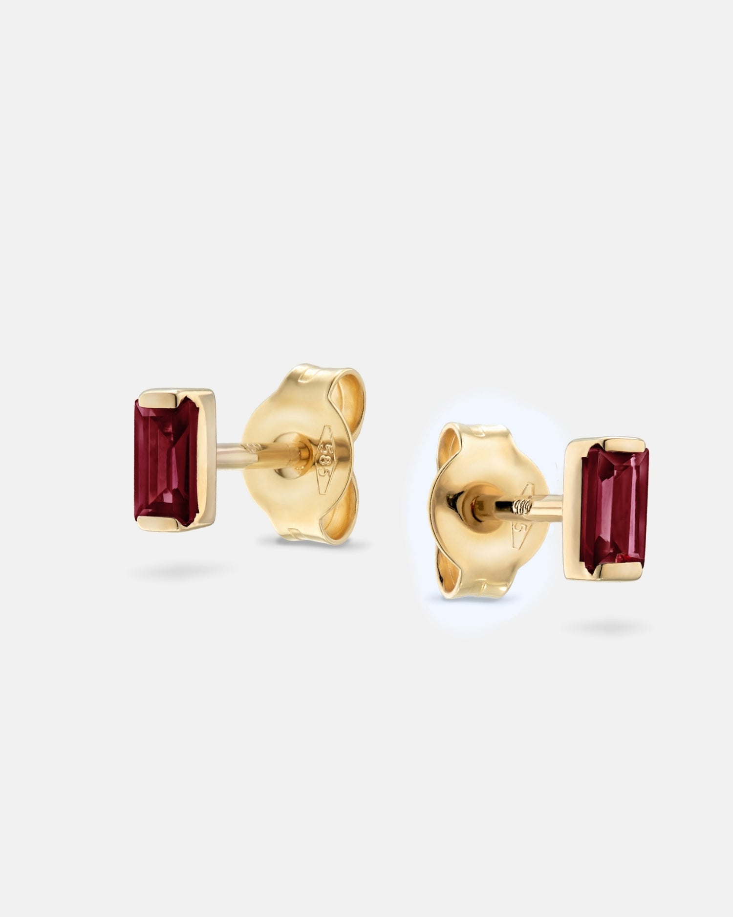 Baguette 14k gold stud earrings with ruby gemstones