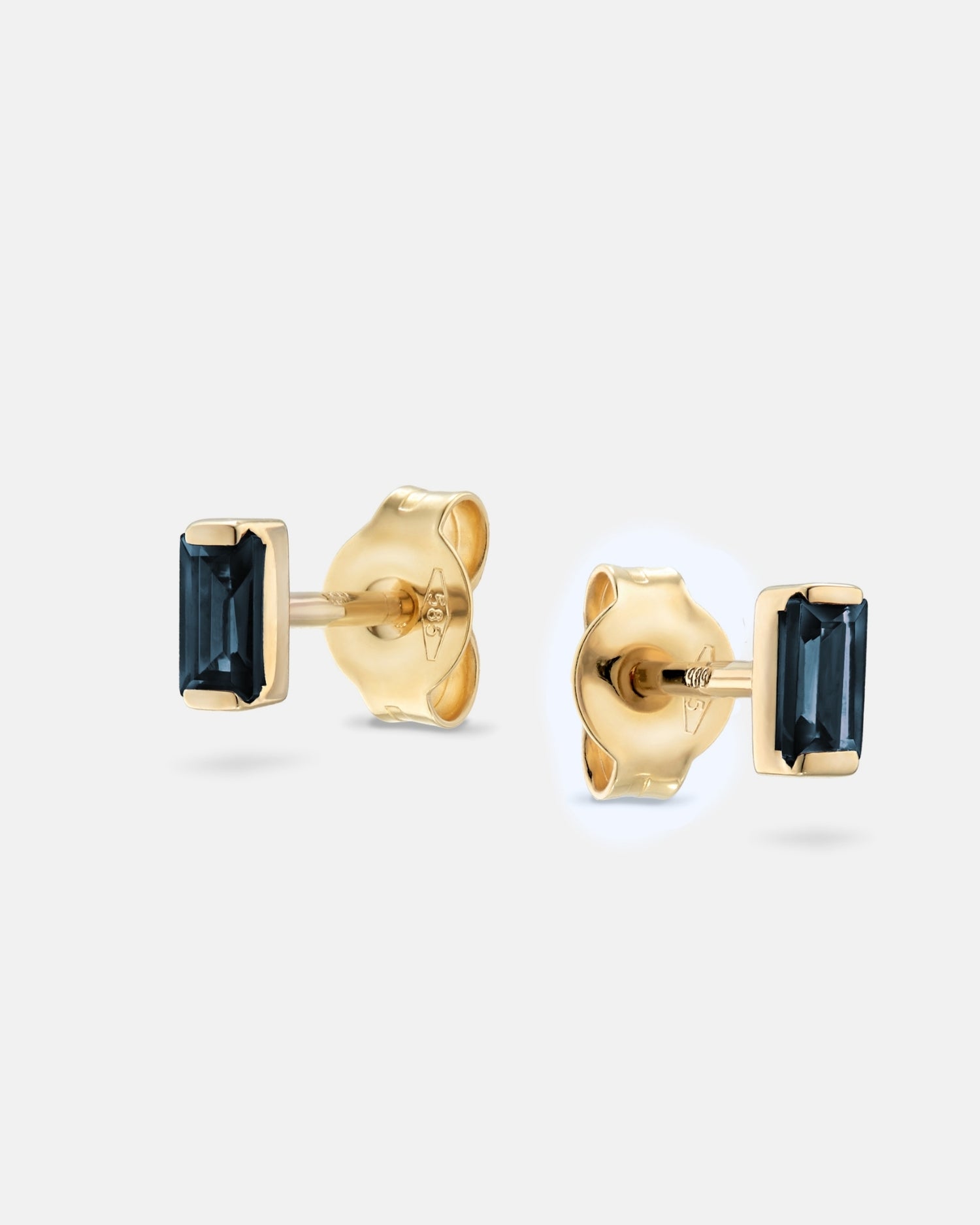 Baguette 14k gold stud earrings with sapphire gemstones