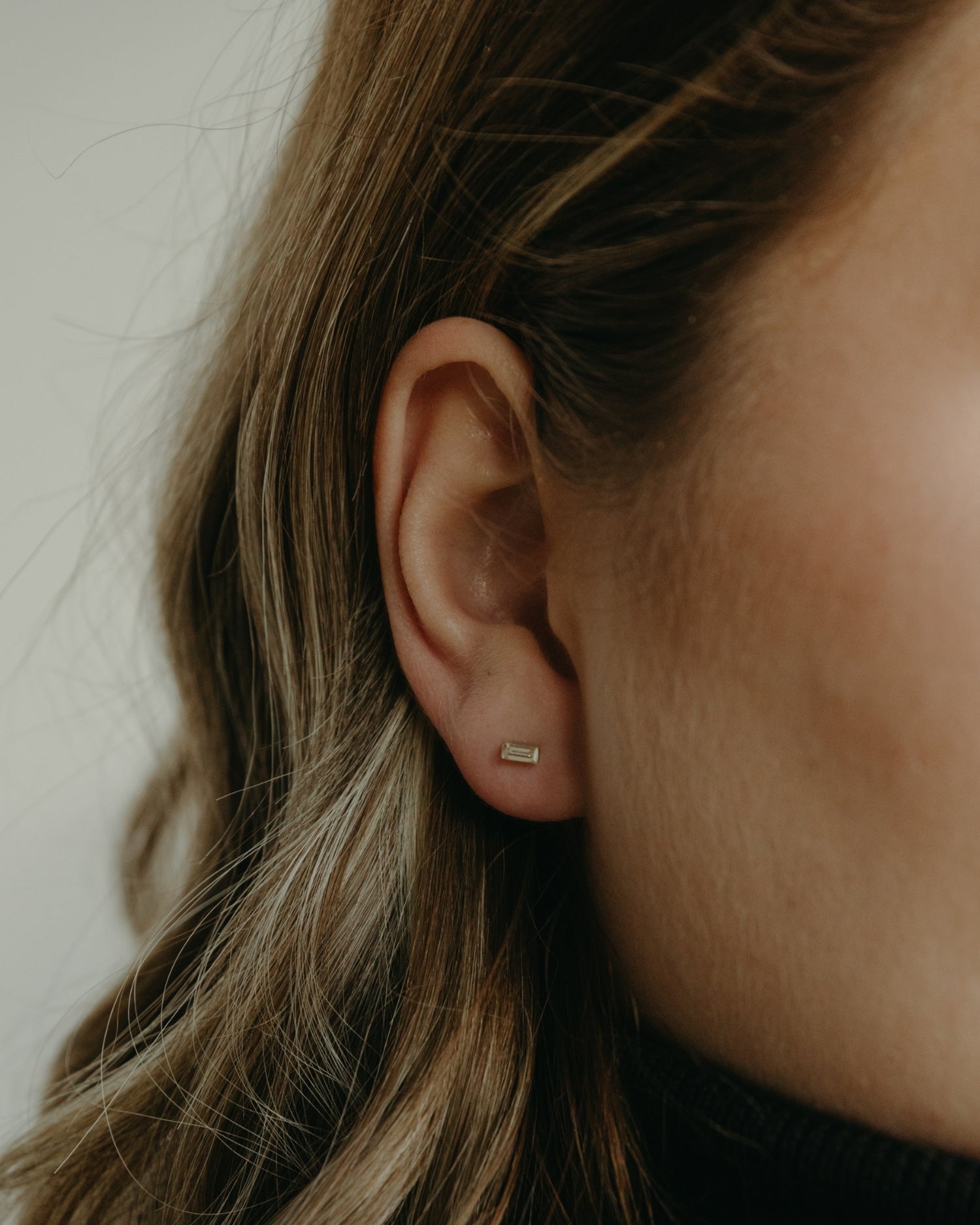 Baguette 14k gold stud earrings with natural diamonds