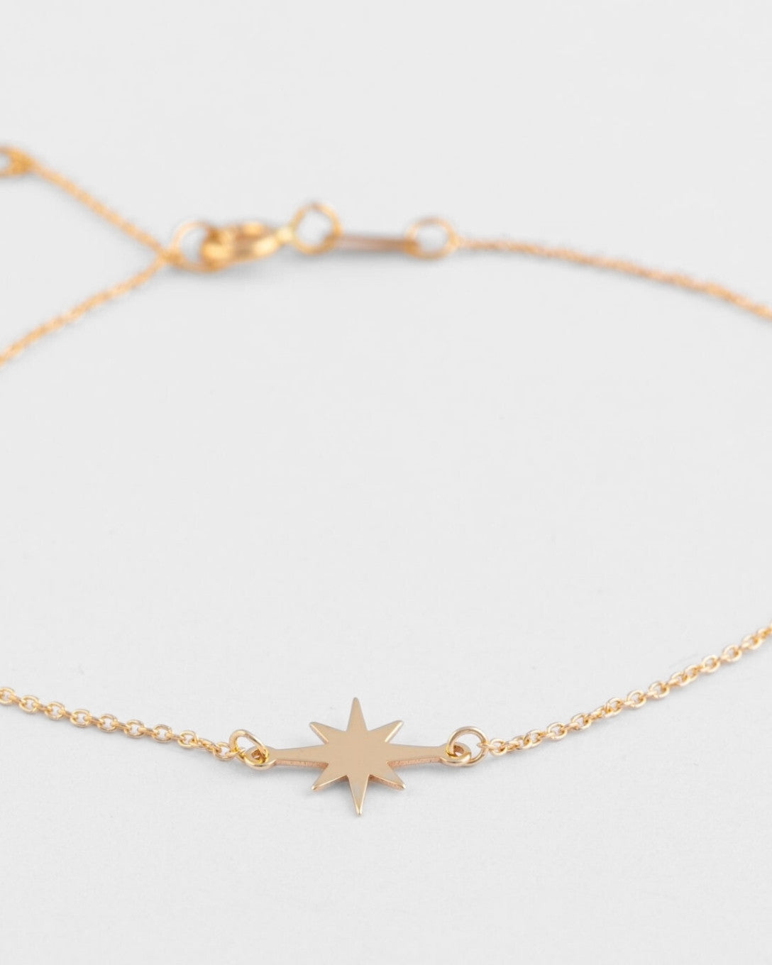Yellow gold star bracelet