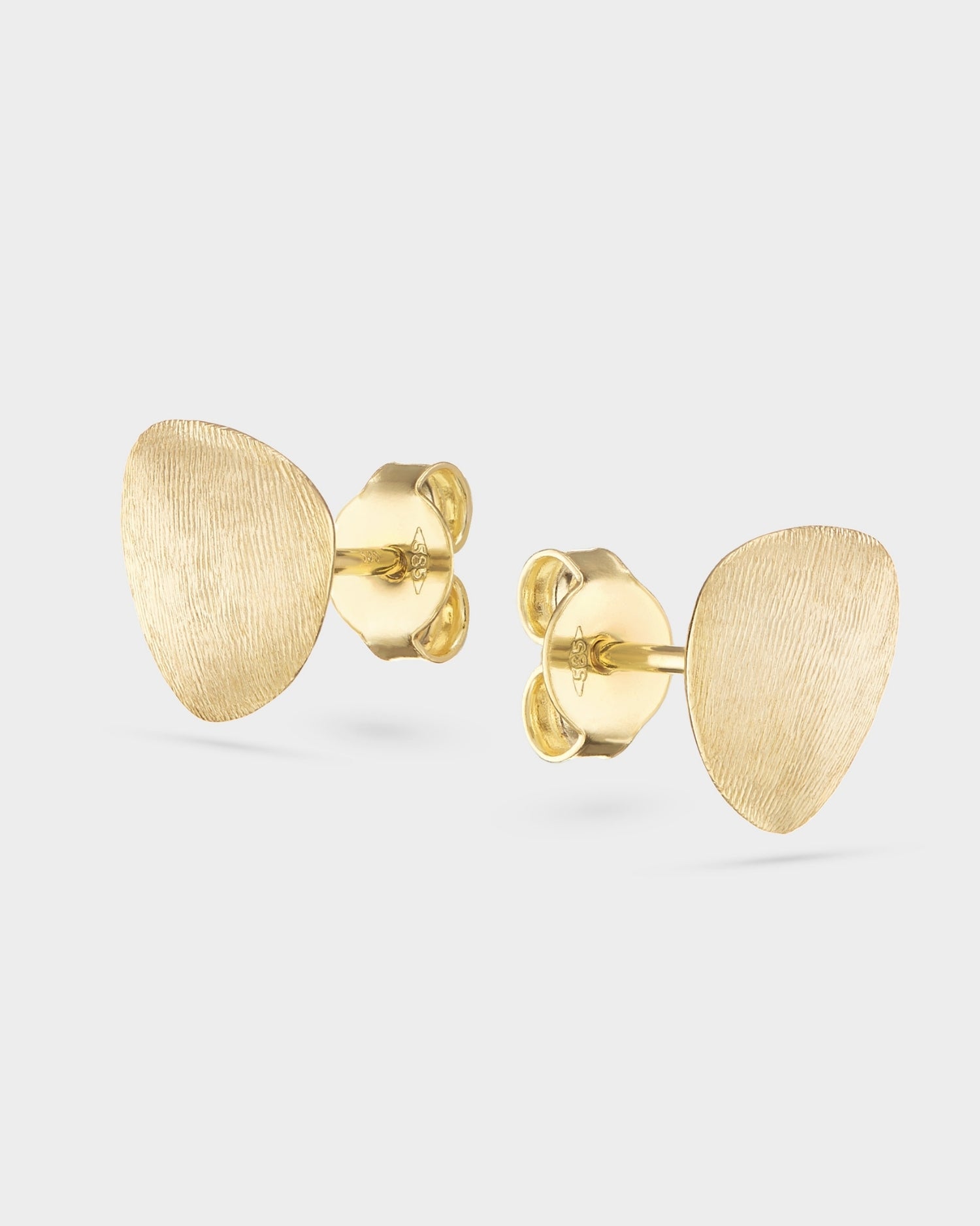 Brushed yellow gold mini stud earrings