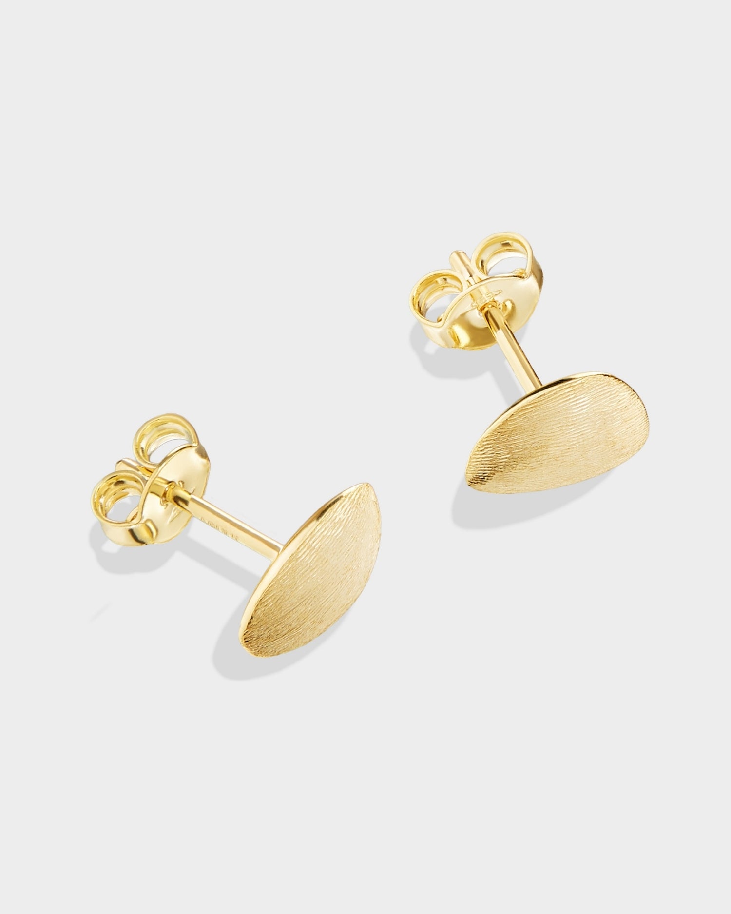 Brushed yellow gold mini stud earrings