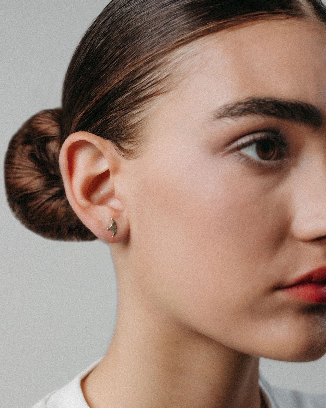 Yellow gold bird stud earrings