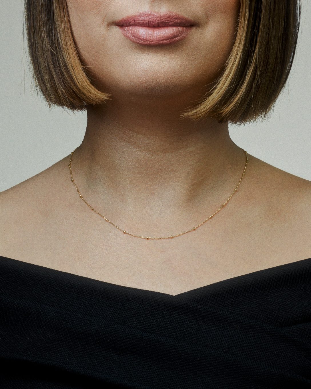 Lanț cu biluțe din aur galben